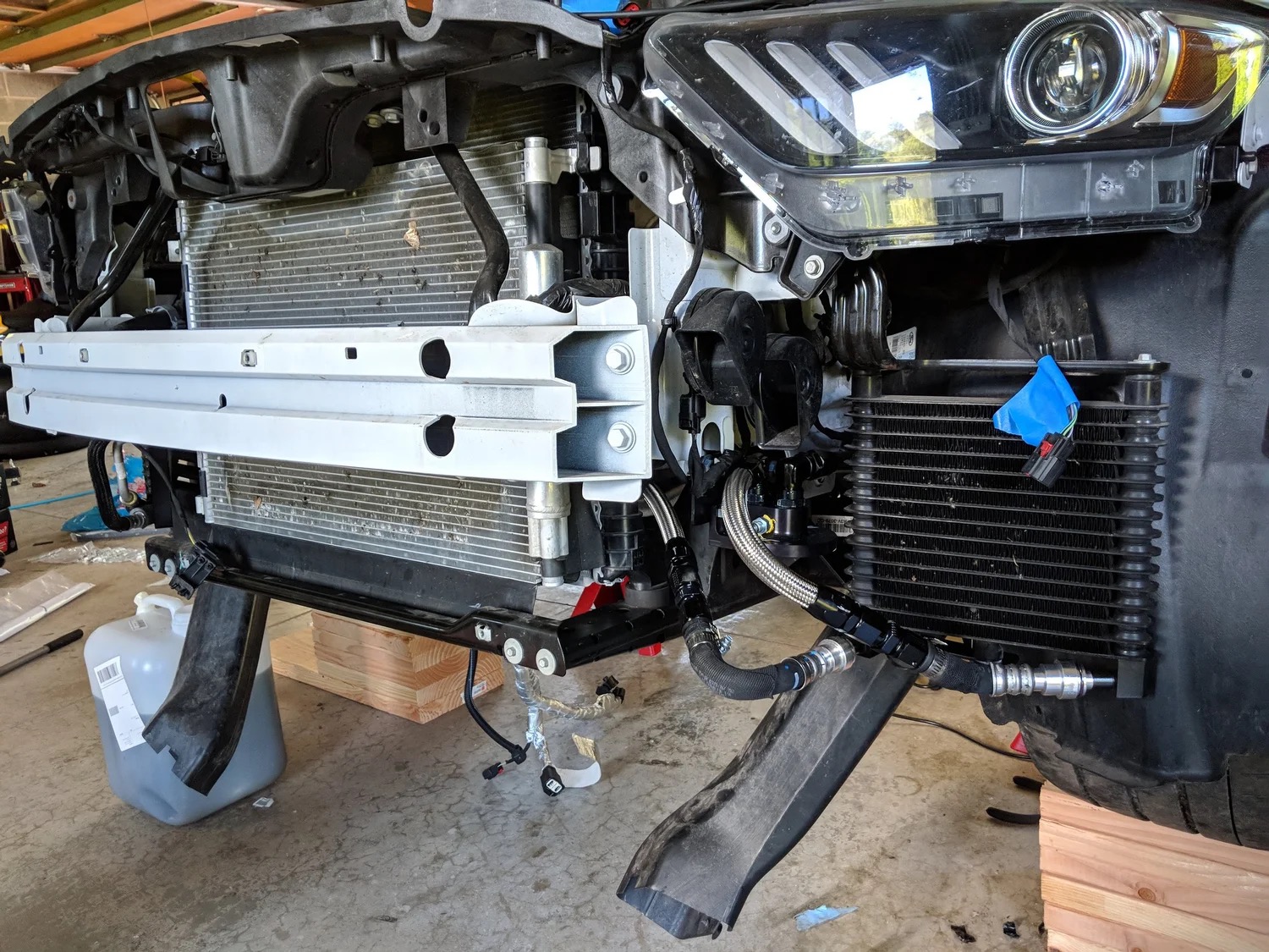 Oil cooler and braided lines installed behind the front bumper